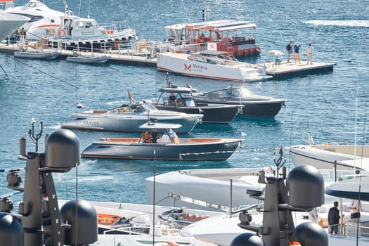 Monaco, Monte Carlo, 27 September 2022 - a lot of luxury yachts at the famous motorboat exhibition in the principality, the most expensive boats for the richest people around the world, yacht brokers. High quality photo