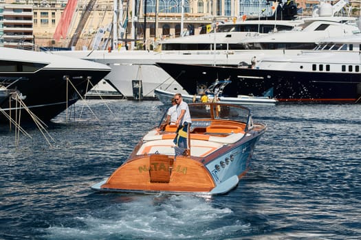 Monaco, Monte Carlo, 27 September 2022 - a lot of luxury yachts at the famous motorboat exhibition in the principality, the most expensive boats for the richest people around the world, yacht brokers. High quality photo