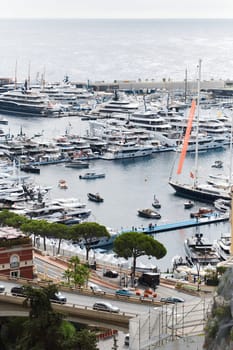 Monaco, Monte Carlo, 27 September 2022 - a lot of luxury yachts at the famous motorboat exhibition in the principality, the most expensive boats for the richest people around the world, yacht brokers. High quality photo