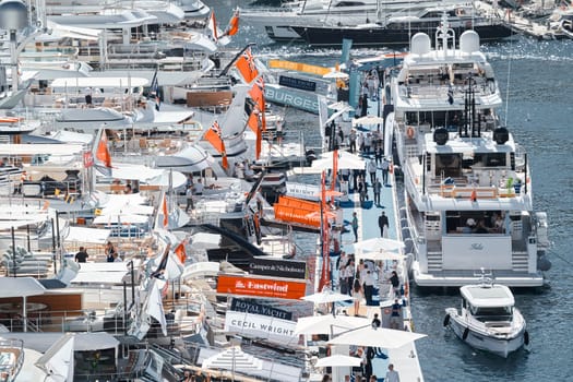 Monaco, Monte Carlo, 27 September 2022 - a lot of luxury yachts at the famous motorboat exhibition in the principality, the most expensive boats for the richest people around the world, yacht brokers. High quality photo