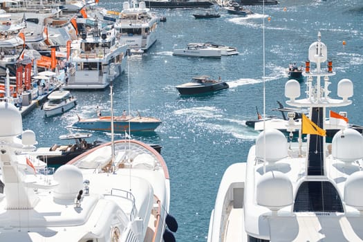 Monaco, Monte Carlo, 27 September 2022 - a lot of luxury yachts at the famous motorboat exhibition in the principality, the most expensive boats for the richest people around the world, yacht brokers. High quality photo