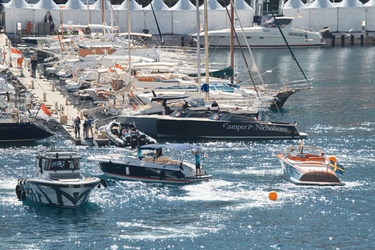 Monaco, Monte Carlo, 27 September 2022 - a lot of luxury yachts at the famous motorboat exhibition in the principality, the most expensive boats for the richest people around the world, yacht brokers. High quality photo