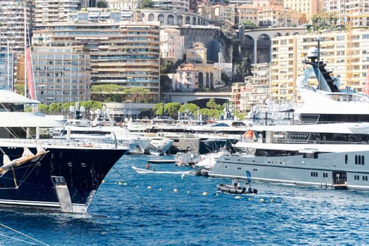 Monaco, Monte Carlo, 27 September 2022 - a lot of luxury yachts at the famous motorboat exhibition in the principality, the most expensive boats for the richest people around the world, yacht brokers. High quality photo