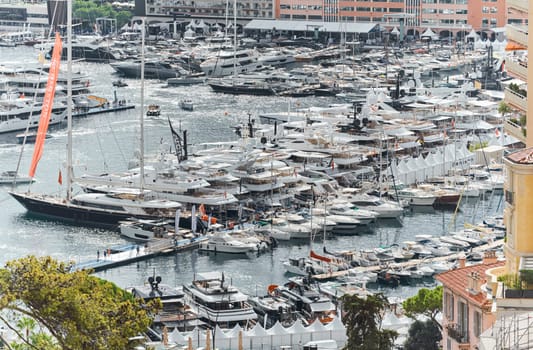 Monaco, Monte Carlo, 27 September 2022 - a lot of luxury yachts at the famous motorboat exhibition in the principality, the most expensive boats for the richest people around the world, yacht brokers. High quality photo