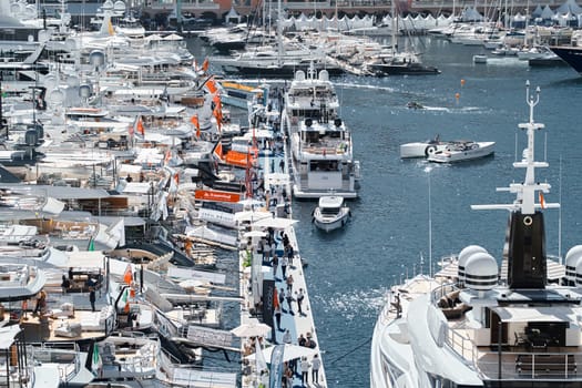 Monaco, Monte Carlo, 27 September 2022 - a lot of luxury yachts at the famous motorboat exhibition in the principality, the most expensive boats for the richest people around the world, yacht brokers. High quality photo