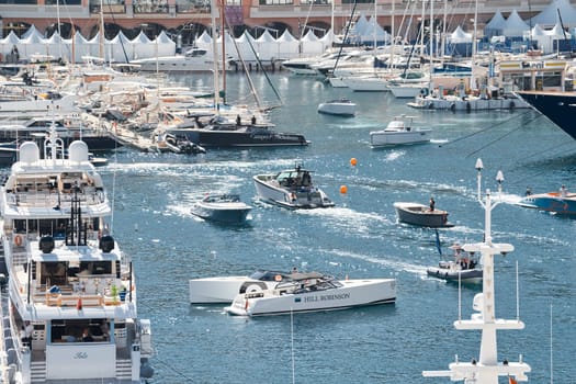 Monaco, Monte Carlo, 27 September 2022 - a lot of luxury yachts at the famous motorboat exhibition in the principality, the most expensive boats for the richest people around the world, yacht brokers. High quality photo