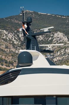 top of huge boat on the largest fair exhibition in the world yacht show, port Hercules, sunny weather, blue sky. High quality photo