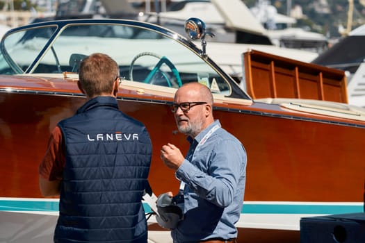 Monaco, Monte-Carlo, 28 September 2022: the blogger makes a report from the event of the largest fair exhibition in the world yacht show MYS, port Hercules, a lot of new mega yachts, yacht brokers. High quality photo