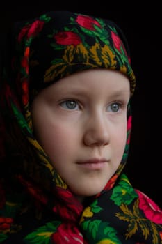 A young girl wearing a hat. High quality photo