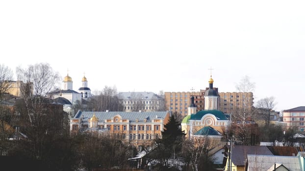City view with Church landmark. Stock footage. Urban landscapes in the winter day.