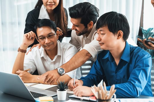 Group of diverse office worker employee working together on strategic business marketing planning in corporate office room. Positive teamwork in business workplace concept. Prudent