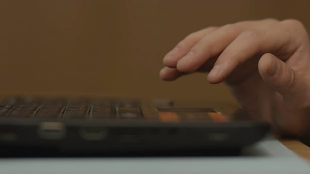 Close up of woman hand touching a tochpad on laptop. Close up of young businesswoman typing on computer laptop at the office or cafe 4K