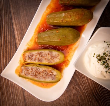 RECIPE FOR LEBANESE-STYLE MINI ZUCCHINI STUFFED WITH RICE AND BEEF IN A TOMATO SAUCE, High quality photo