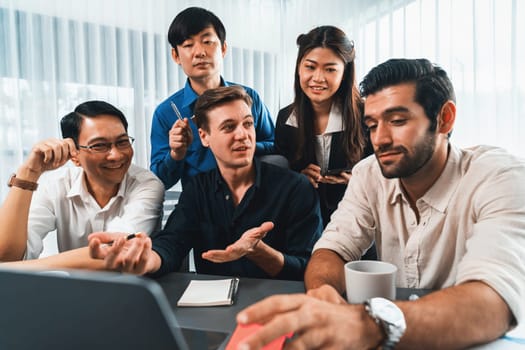 Group of diverse office worker employee working together on strategic business marketing planning in corporate office room. Positive teamwork in business workplace concept. Prudent