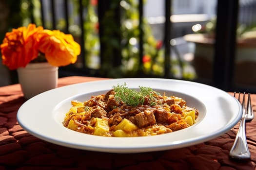 Cassoeula, traditional Lombardy dish with a stew made with pork meat and cabbage, often served with polenta. Italian seasonal comfort dish.