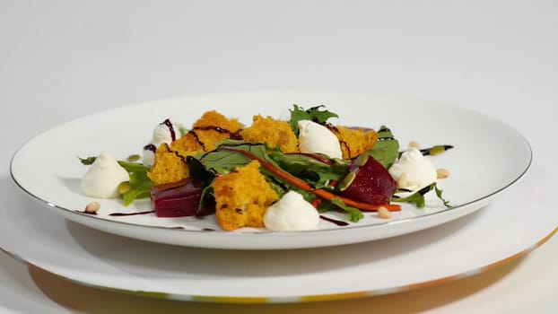 Salad with herring, beetroot, paprika, red onion, mustard and balsamic vinegar. Salad of lettuce, beetroot and salmon fillets with a delicate cream sauce. Salad with greens, fish and beetroot 4K