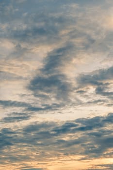 Abstract background sky Dawn Sunset Contrast dark shadow bright cloud sun orange silhouette above the mountains near the sea.