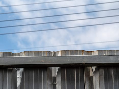 Metal sheet surface texture, Metal sheet Fence and sky