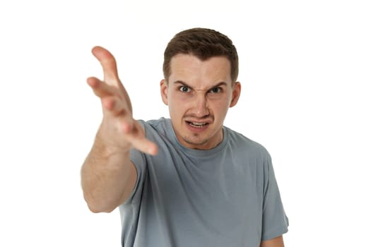annoyed angry bearded man shouting on white studio background
