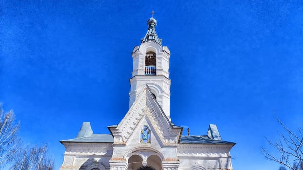 Orthodox church with a dome against the backdrop of a spring or summer sky with clouds. Beautiful old historic temple