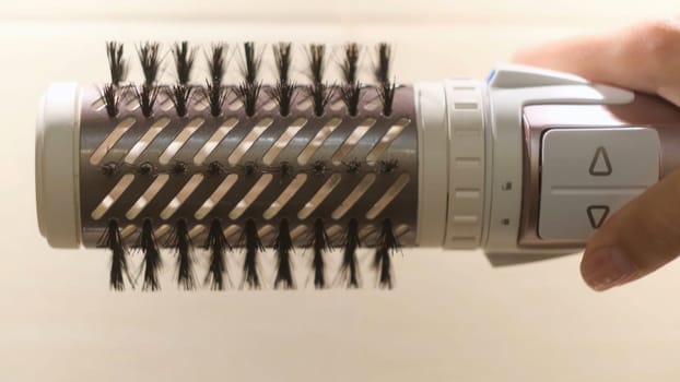 Close up of a special removable nozzle of hairdresser. Female automatic machine for hair drying, professional tools for hair styling.