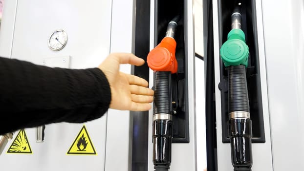 Gas station. Media.Cylinders with gasoline and gas are taken and then put in place for refueling the car. High quality 4k footage