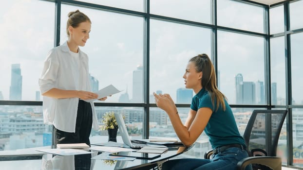 Smart businesswoman present start up project while executive manager listen carefully. Professional business team working together, sharing, discussing, thinking about business idea. Tracery