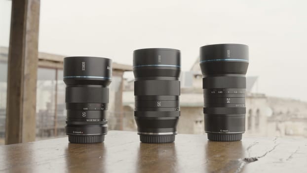 Professional equipment for shooting. Action. Camera lenses taken in nature, and the camera itself for shooting landscapes and portraits. High quality 4k footage