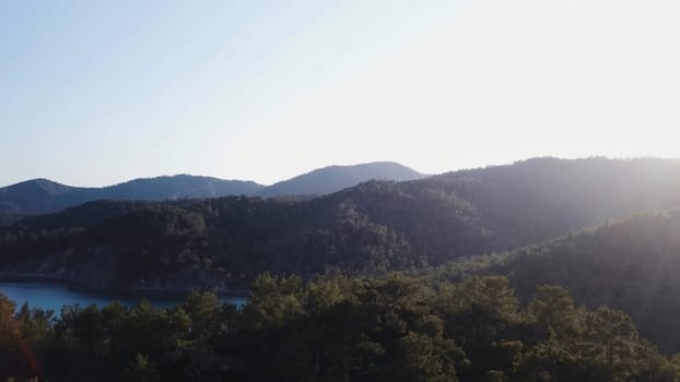 Beautiful landscape nature of rainforest and mountain background. Top view of tropical mountains on a Sunny day.