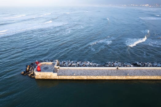 Documentation of the right side of the port of Viareggio photographed at dawn 