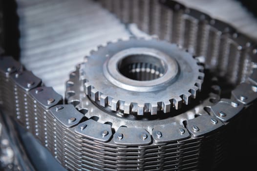 Close-up of a transfer case chain with gear removed from the transmission.