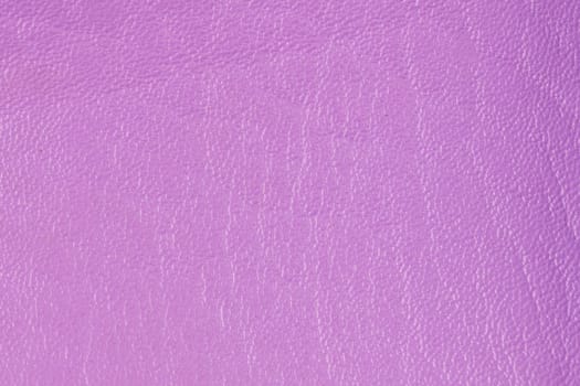 Closeup detail of purple leather texture background.