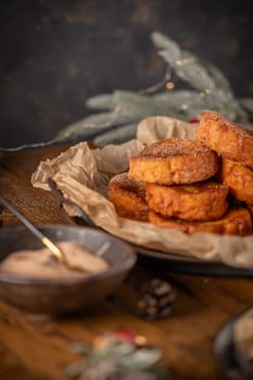 Traditional Portuguese Christmas Rabanadas. Spanish Torrijas on kitchen countertop.