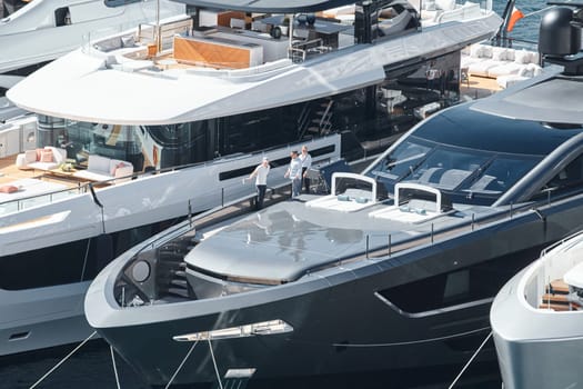 Monaco, Monte Carlo, 27 September 2022 - a lot of luxury yachts at the famous motorboat exhibition in the principality, the most expensive boats for the richest people around the world, yacht brokers. High quality photo