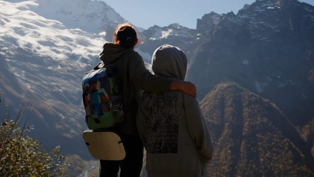 Family hikers exploring mountains on a sunny day. Creative. Concept of active lifestyle