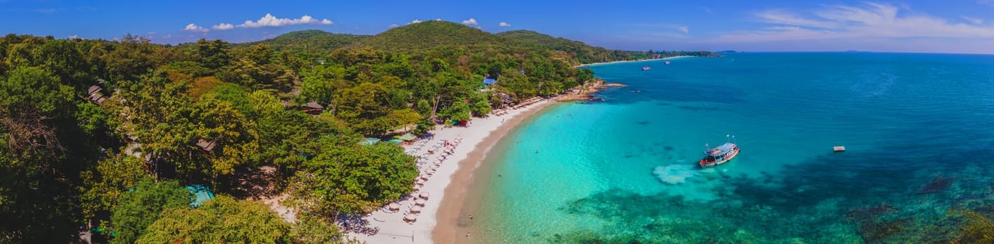 Koh Samet Island Thailand, aerial drone view from above at the Samed Island in Thailand with a turqouse colored ocean and a white tropical beach from above drone view panorama