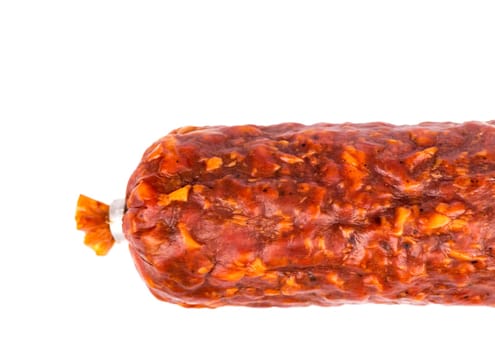 piece of smoked pork sausage on a white background it is isolated