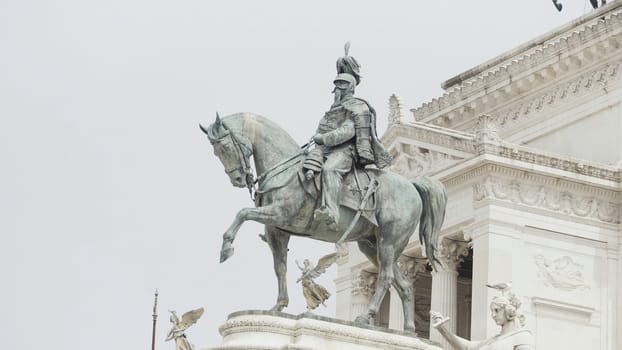 Italy, Milan - August 30, 2022: Famous statues of Italy. Action. Beautiful monuments in squares of Italy. Cultural attractions and sculptures on streets of ancient historical city. Monument to Victor Emmanuel II.