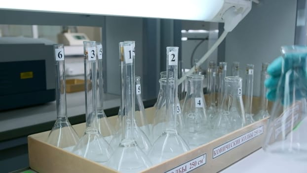 Chemical experiments.Clip. Various glass tubes in which solutions of different colors interfere. High quality FullHD footage
