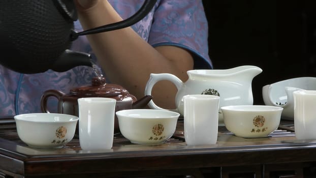 Close-up table for the tea ceremony utensils and bamboo. Chinese tea ceremony. Japanese tea ceremony 4K