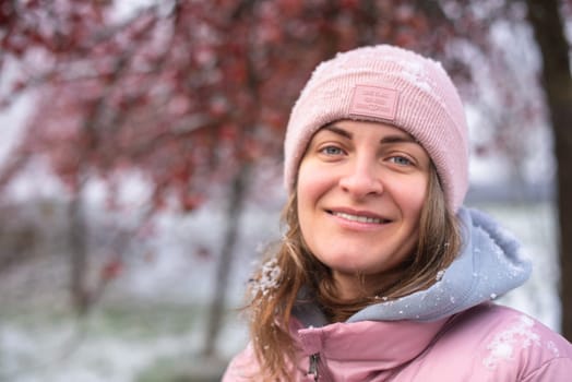 Winter Elegance: Portrait of a Beautiful Girl in a Snowy European Village