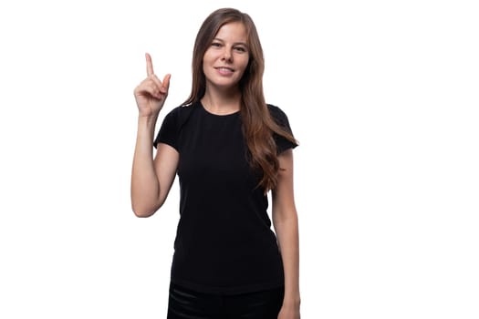 Portrait of a young well-groomed woman dressed in a basic T-shirt.