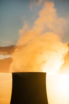 Sunset at the power plant for the exploitation of boraciferous blowers for the production of electricity in Tuscany, Italy 