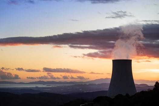 Sunset at the power plant for the exploitation of boraciferous blowers for the production of electricity in Tuscany, Italy 