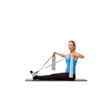 Fitness, resistance band and portrait of woman doing exercise in studio for health, wellness and bodycare. Sport, yoga mat and person from Canada with arm workout or training by white background
