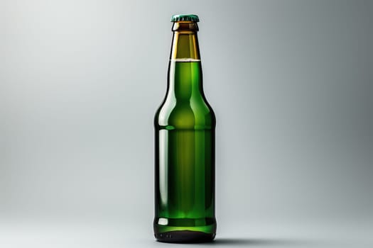 Green beer bottle isolated on white gray background, beer advertising banner.