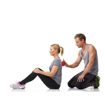 Massage ball, physiotherapy and studio with a woman with sport, fitness and workout back injury. Physical therapy, man and wellness with physio health and helping with white background and support.