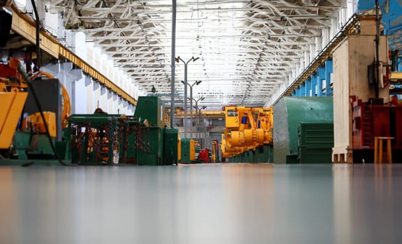 Half ready heavy truck standing at the end of production line.