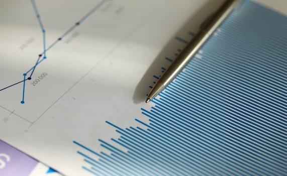 Close-up of significant charts and graphs lying on table in office. Business documents used to analyze successful corporation investment. Reports sale concept