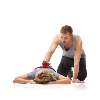 Massage ball, sport physiotherapy and back in studio with a woman with sport, fitness and workout injury. Physical therapy, man and wellness with physio health and helping with white background.
